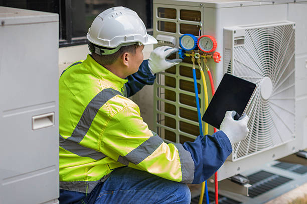 Professional Air Duct Cleaning technician working in Willisburg, KY